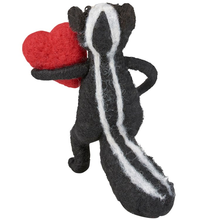 Felt skunk with heart