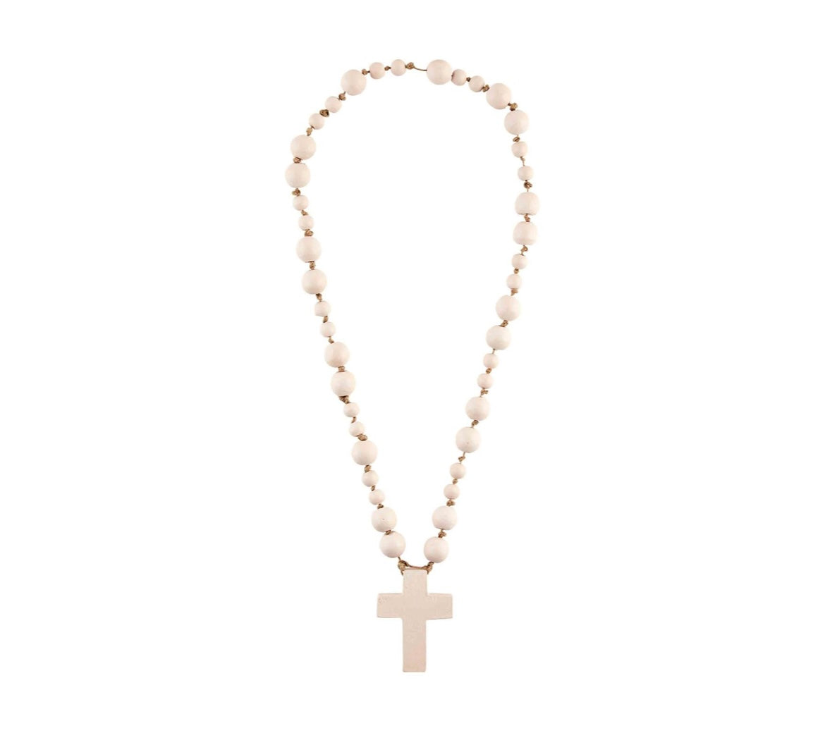 Pink mud pie cross beads