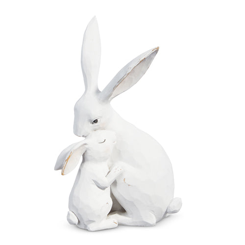 Rabbit and baby cuddling