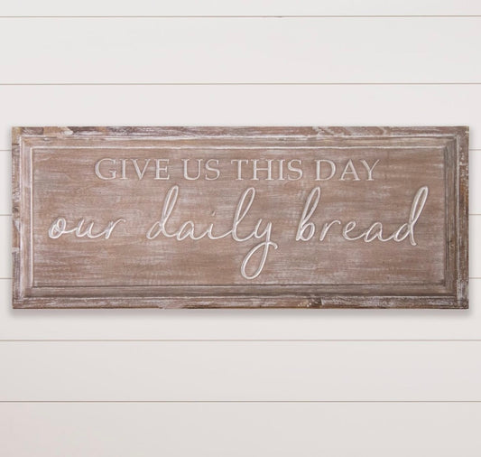 Carved daily bread sign