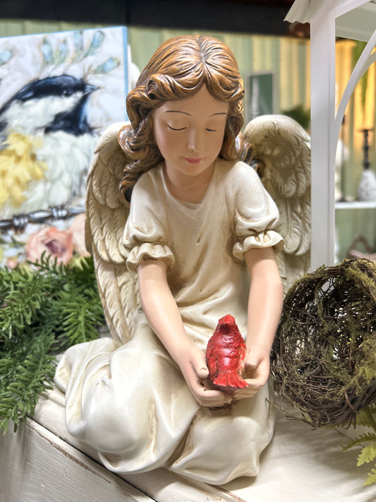 Angel with cardinal